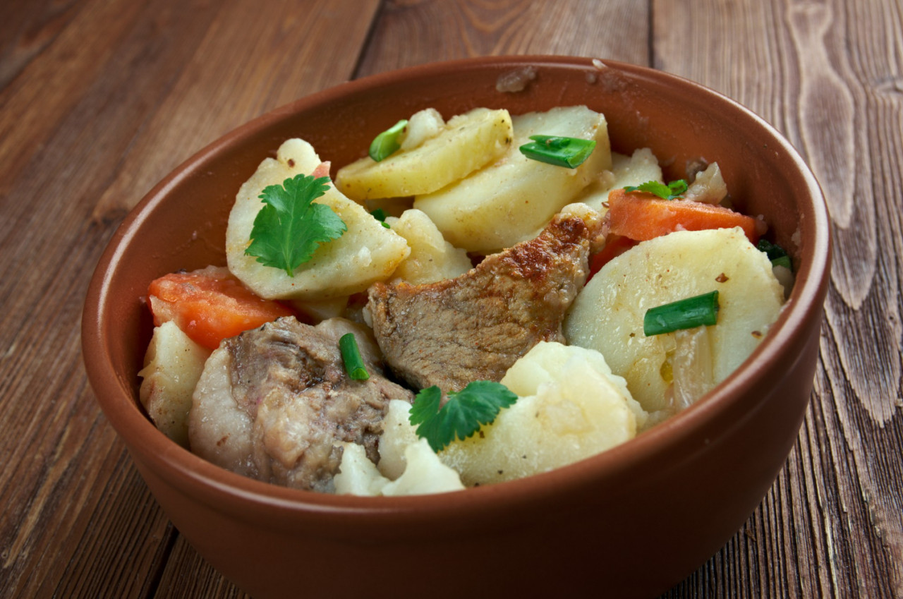 baeckeoffe ypical dish from french germany mix sliced potatoes sliced onions cubed mutton beef pork