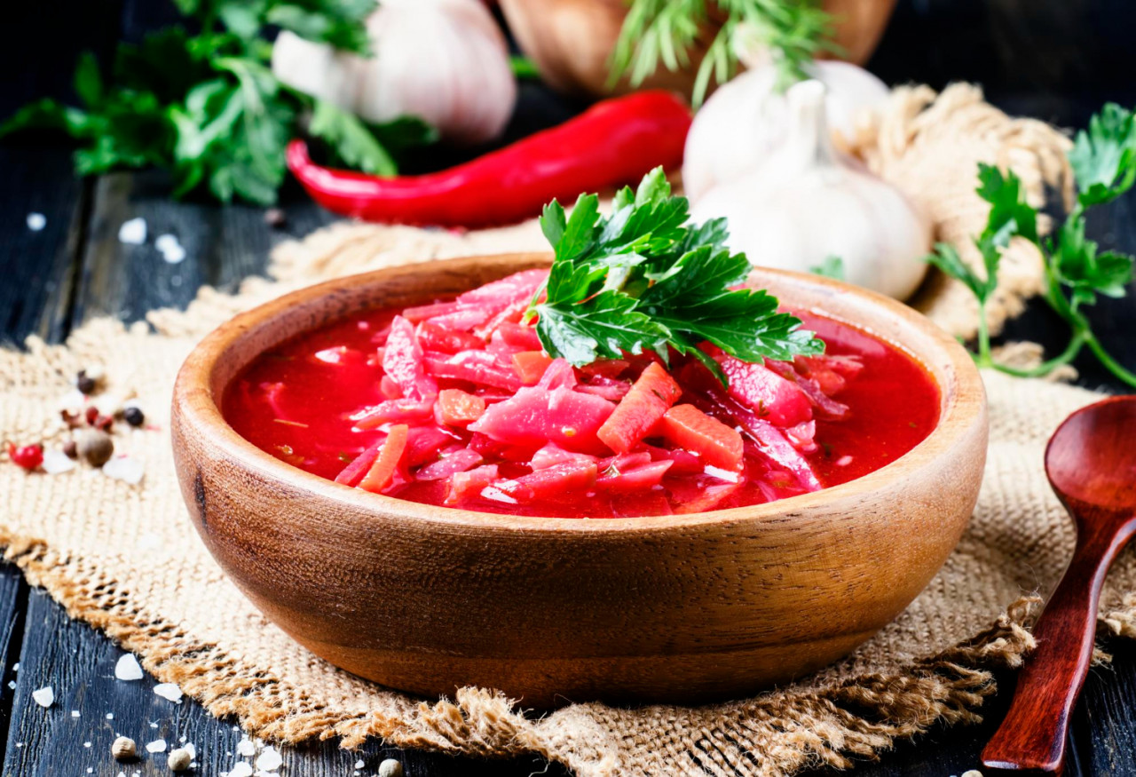 borsch soup with beets cabbage meat wooden bowl rustic style selective focus