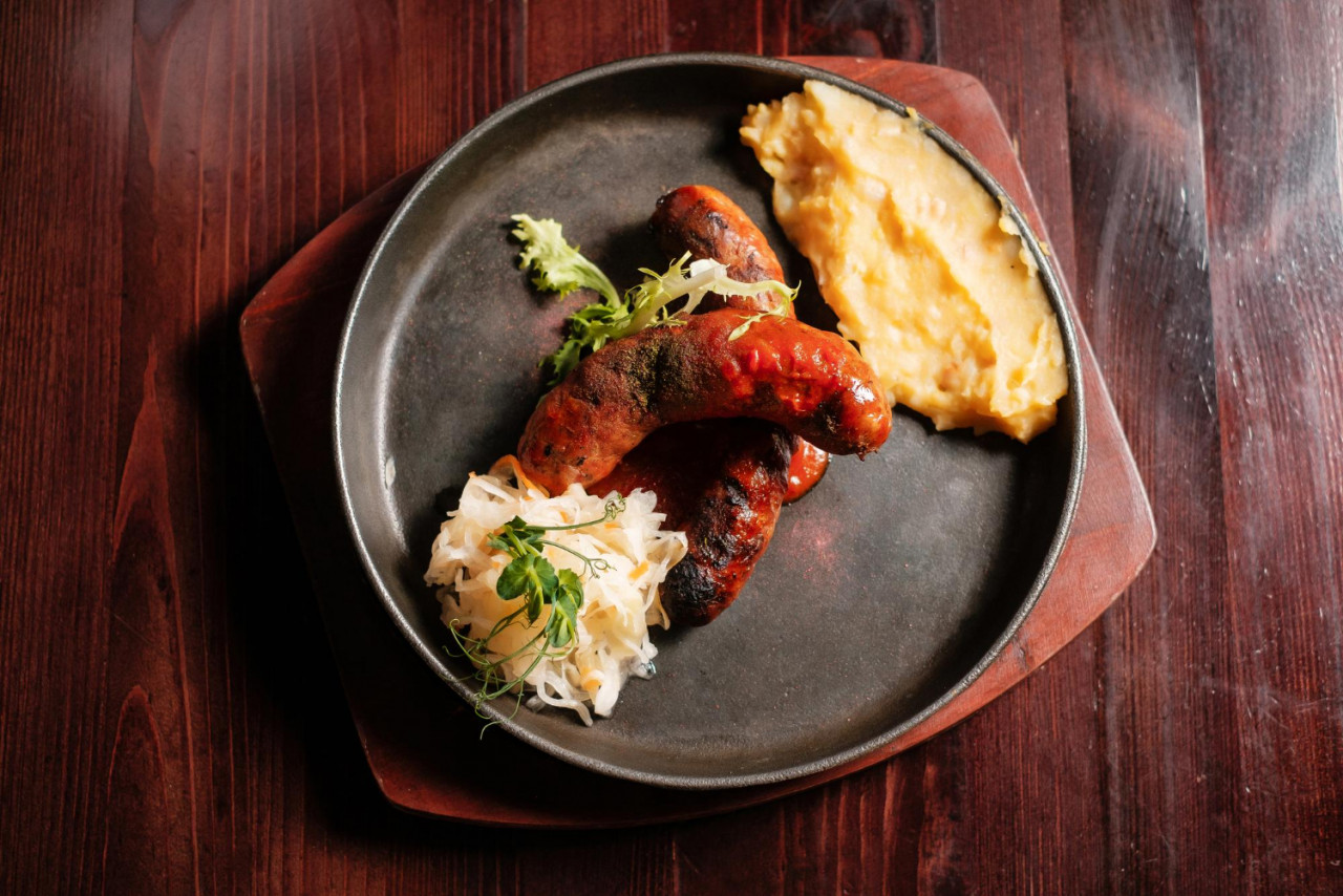 fried sausages with mashed potatoes cabbage