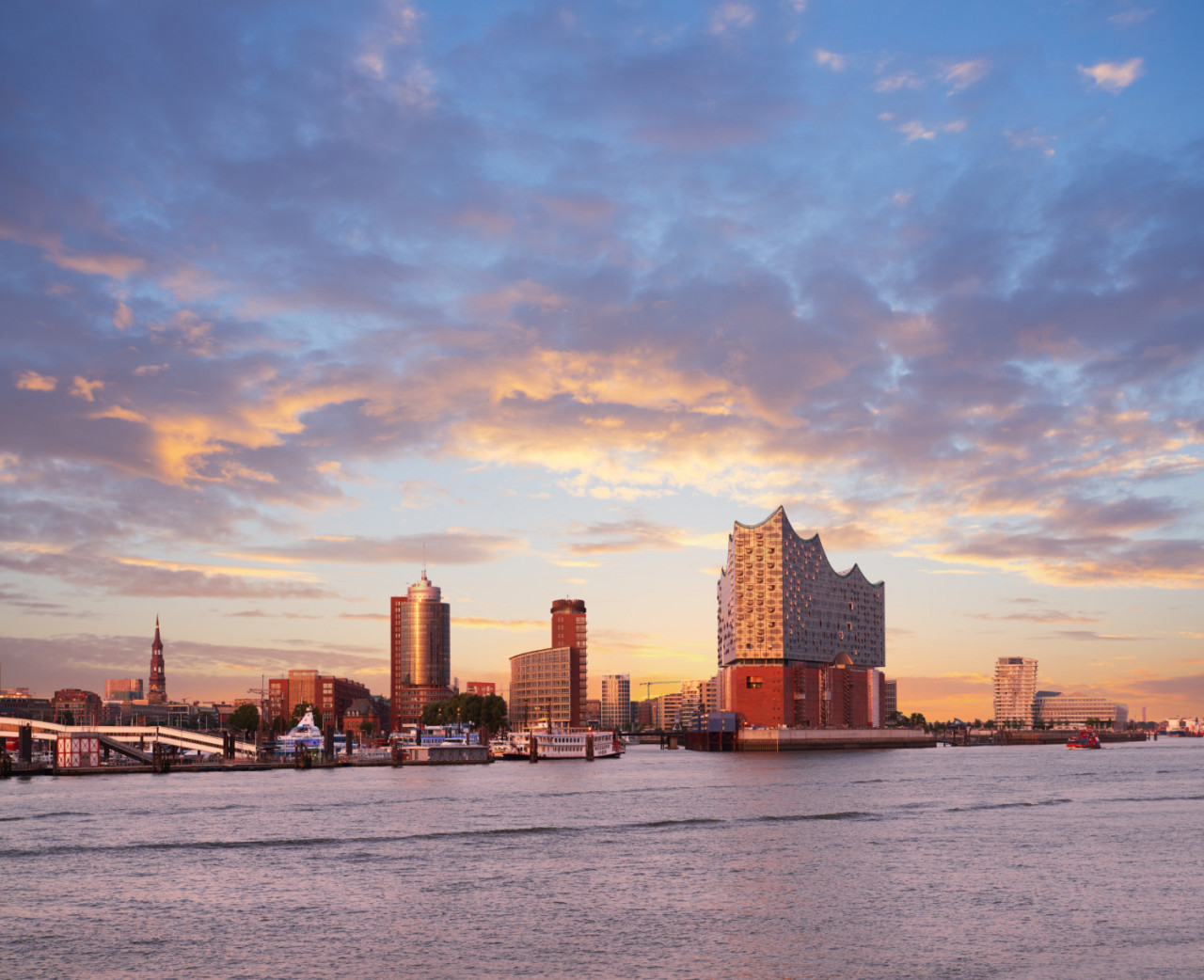 hambirg view on the elbe river towards elbphilharmonie at sunset