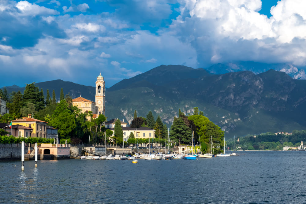 lake como tremezzo town with marina with yachts italy