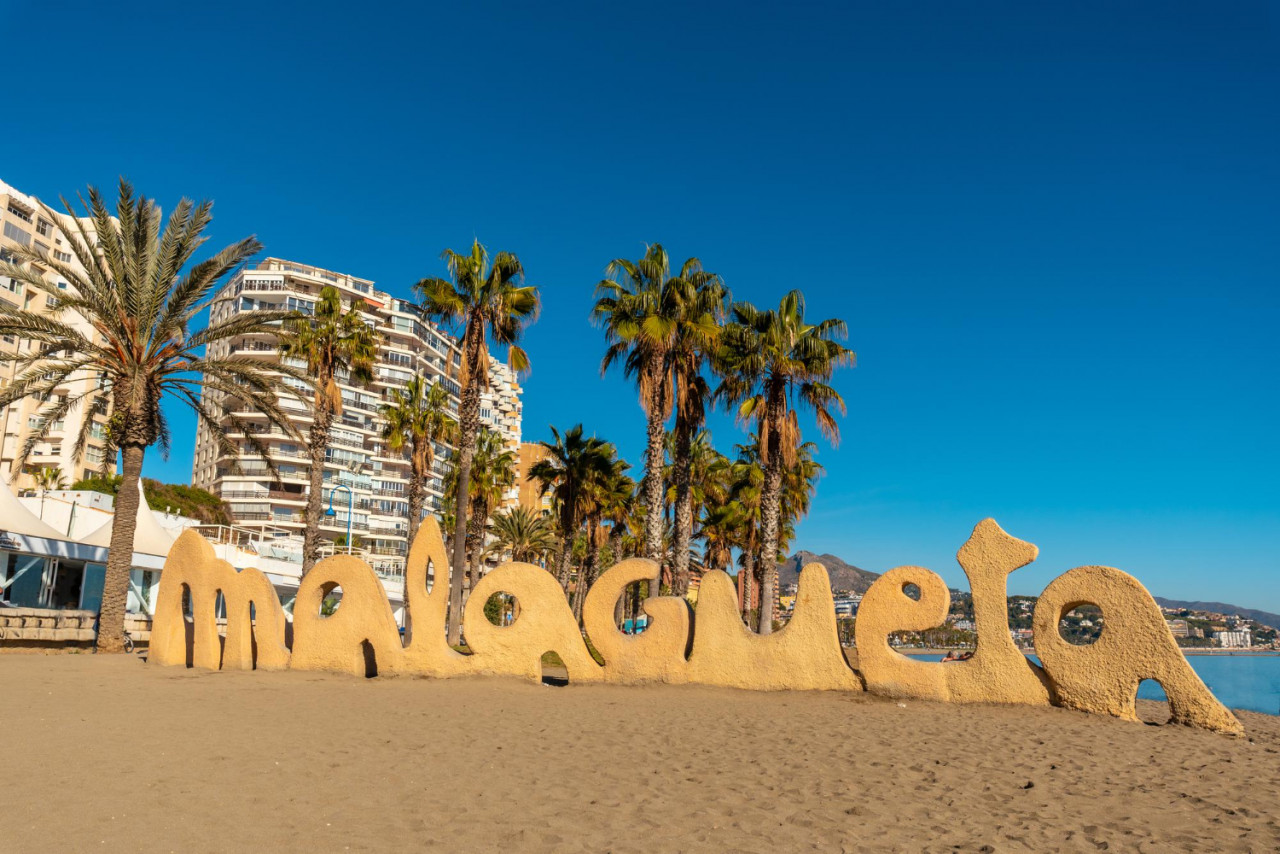 logo malagueta beach its palm trees city malaga andalusia spain