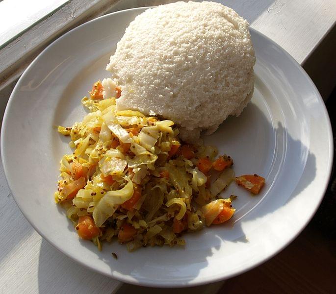 piatto tipico ugali and cabbage
