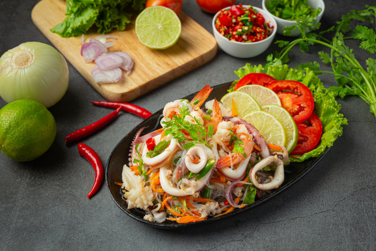 spicy mixed seafood salad with thai food ingredients