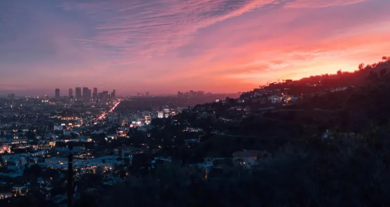 City Near Mountain During Golden Hour