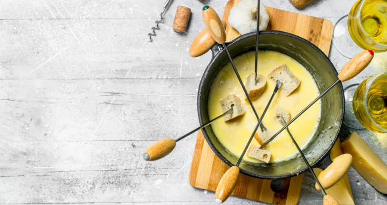 Delicious Fondue Cheese With Bread White Wine Rustic Background