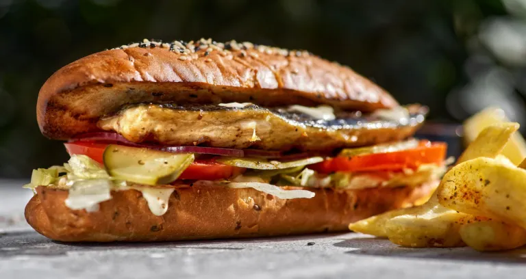 Fried Fish Sandwich With Tartar Sauce French Fries Stone