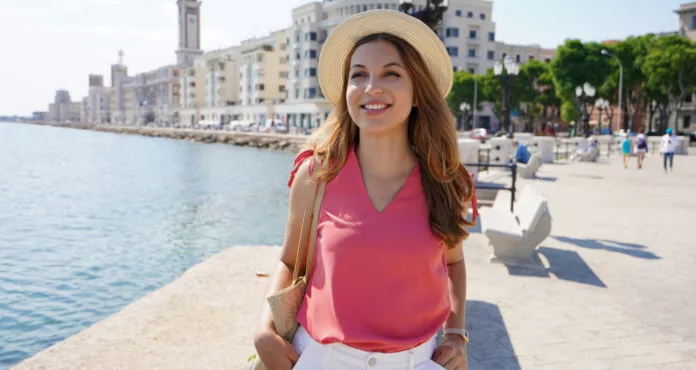 Smiling Tourist Woman Strolling Bari Promenade Apulia Italy