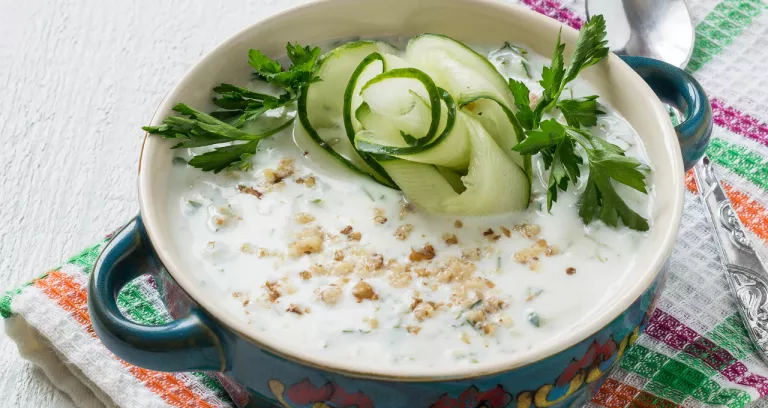Spring Bulgarian Cold Soup Tarator With Yogurt Cucumber Garlic Dill Walnuts Glass Beakers White Wooden Table