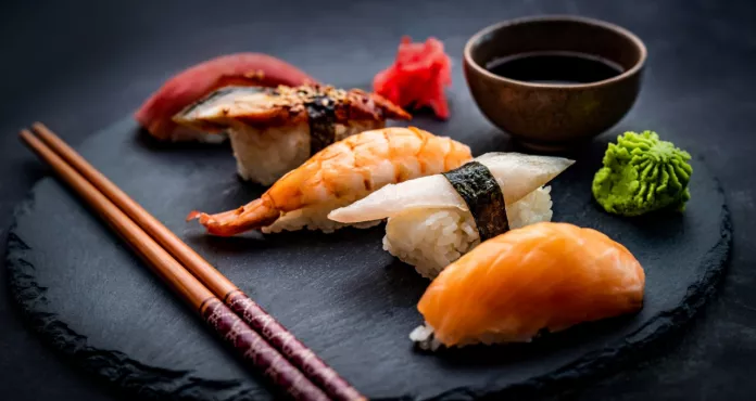 Tasty Sushi Sashimi Set Composition With Shrimps Ginger Soy Sauce Served With Chopsticks Gre
