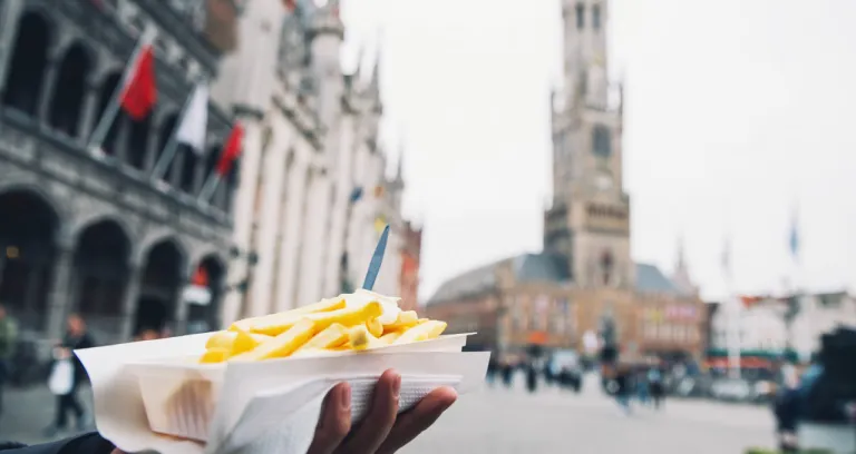 Tourist Holds Popular Street Junk Food French Fries Holland Amsterdam Netherlands