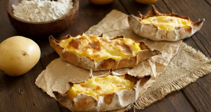 Traditional Karelian Pasties With Potatoes Wooden Table