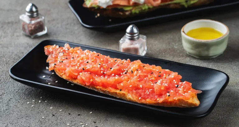 Traditional Spanish Breakfast Tostada With Different Toppings Dark Background