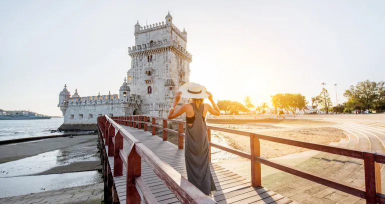 Young Woman Tourist Walking Bridge Belem Tower Riverside During Sunset Lisbon Portugal 1