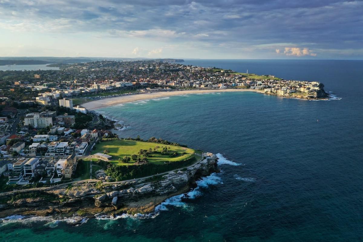 aerial photography of city beside body of water 1