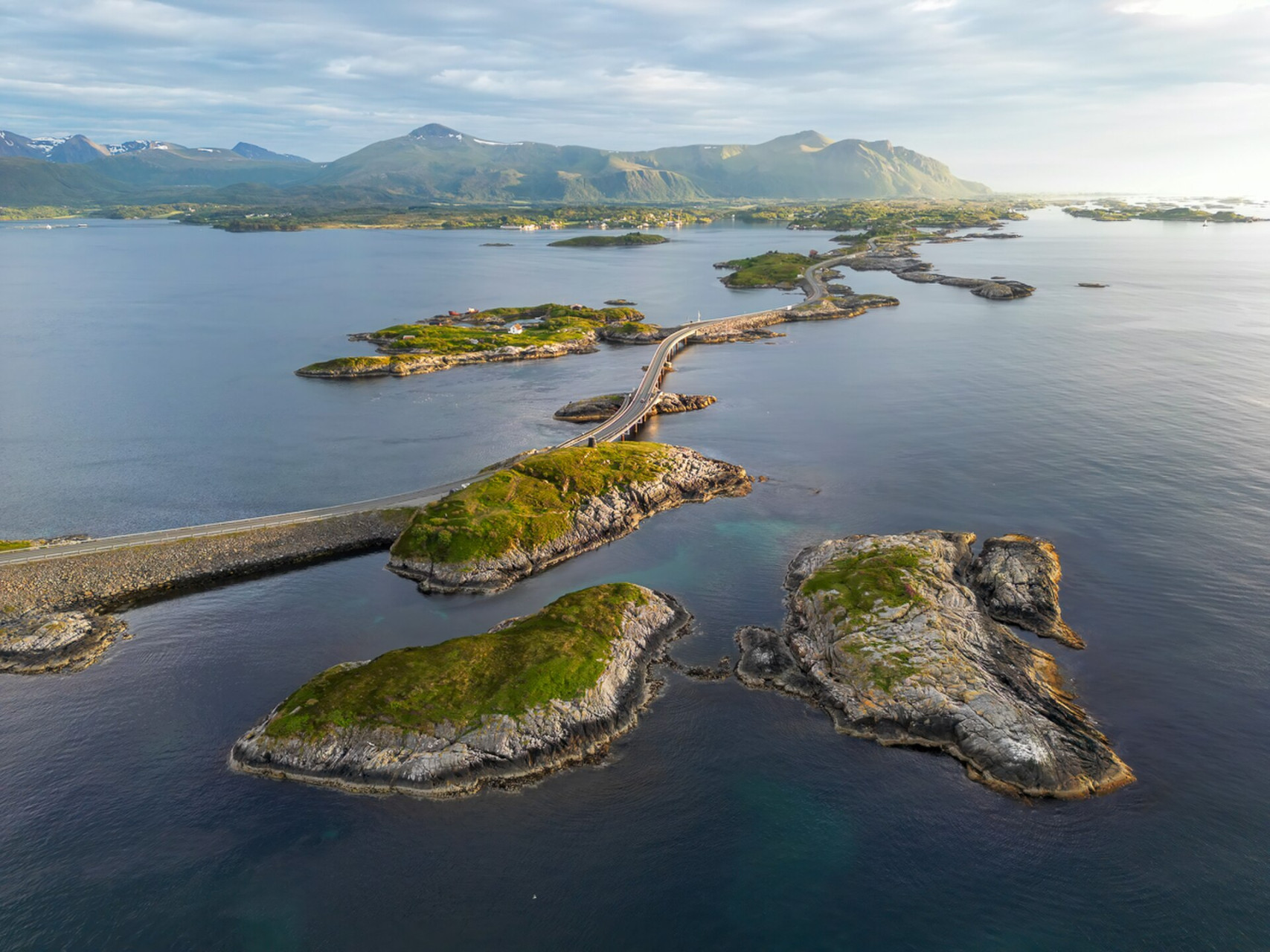 aerial view of atlantic ocean road taken during midnight sun
