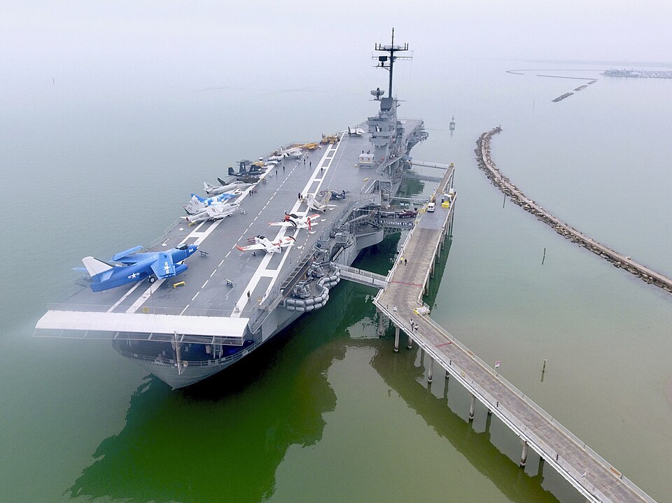 an aerial photo of the uss lexington in corpus christi