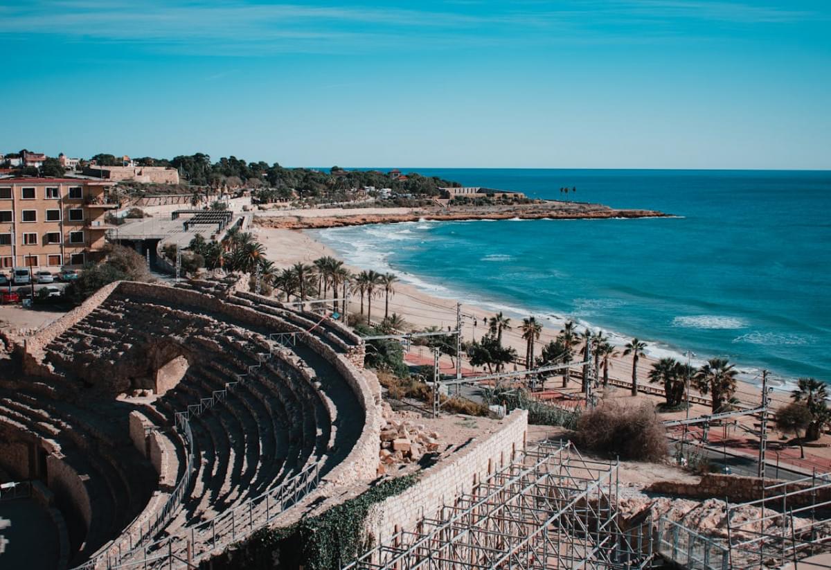 an aerial shot of a the playa el miracle beach