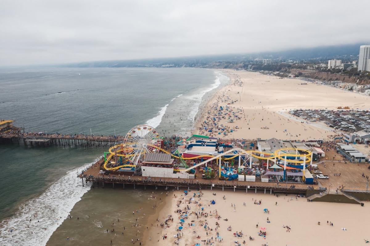 an aerial shot of the santa monica pier in california