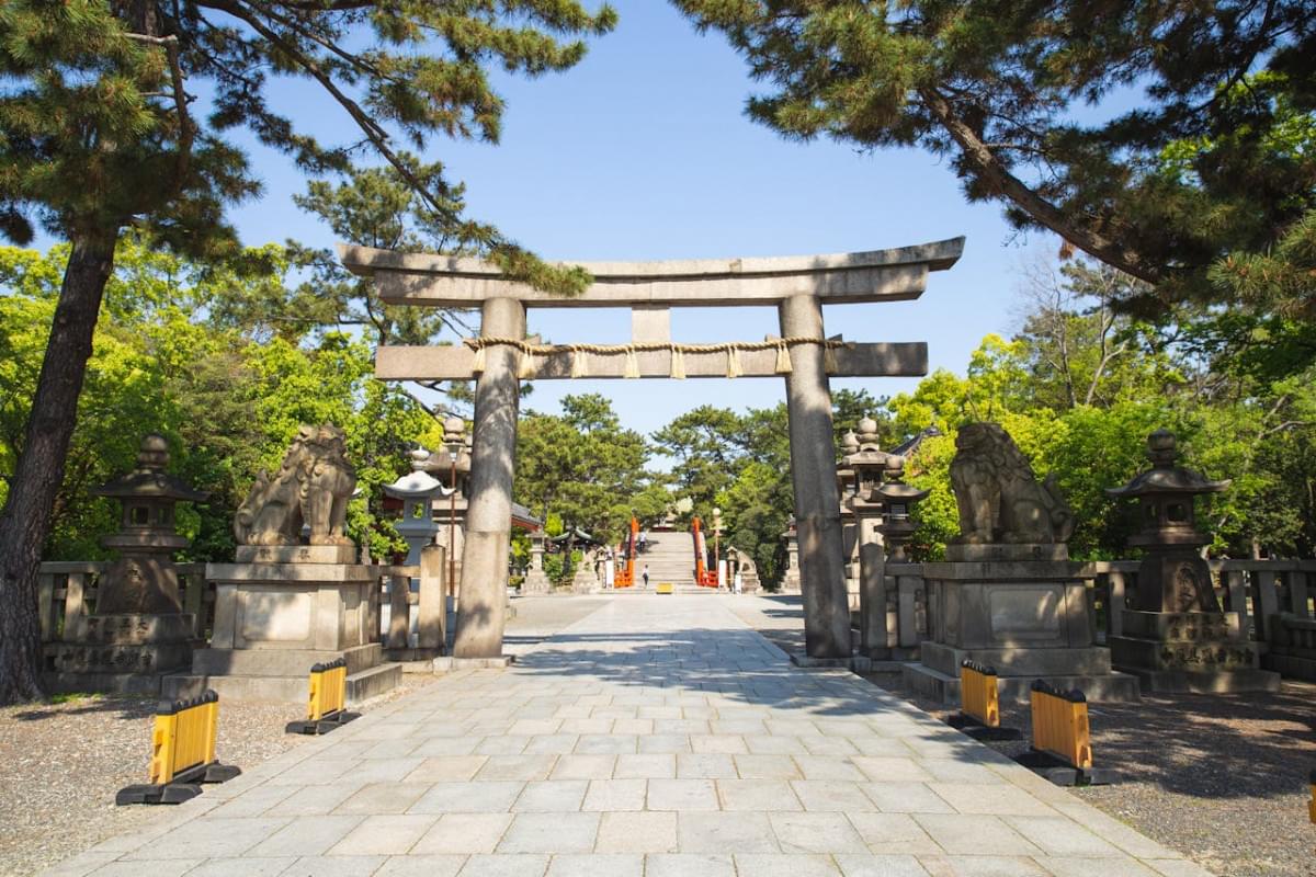 ancient stone gate located near old temple in japan 1 1