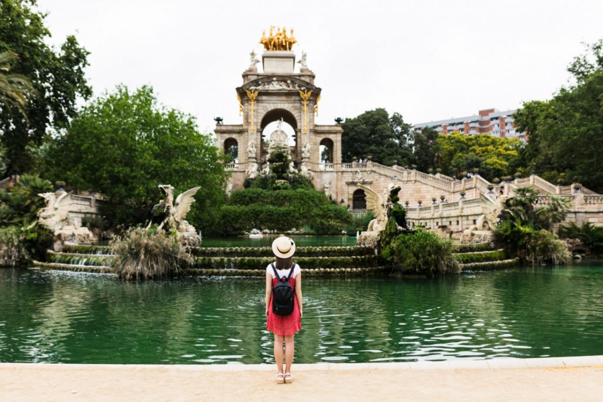 back view young woman traveler visiting ciutadella park barcelona ummer holidays concept