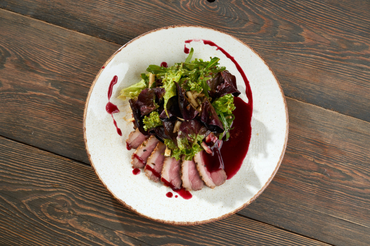 bacon slices served with cranberry sauce lettuce