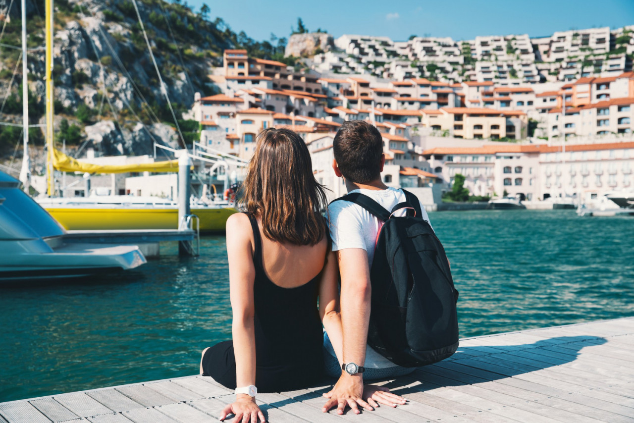 beautiful couple walking portopiccolo sistiana italy europe lifestyle holidays travel