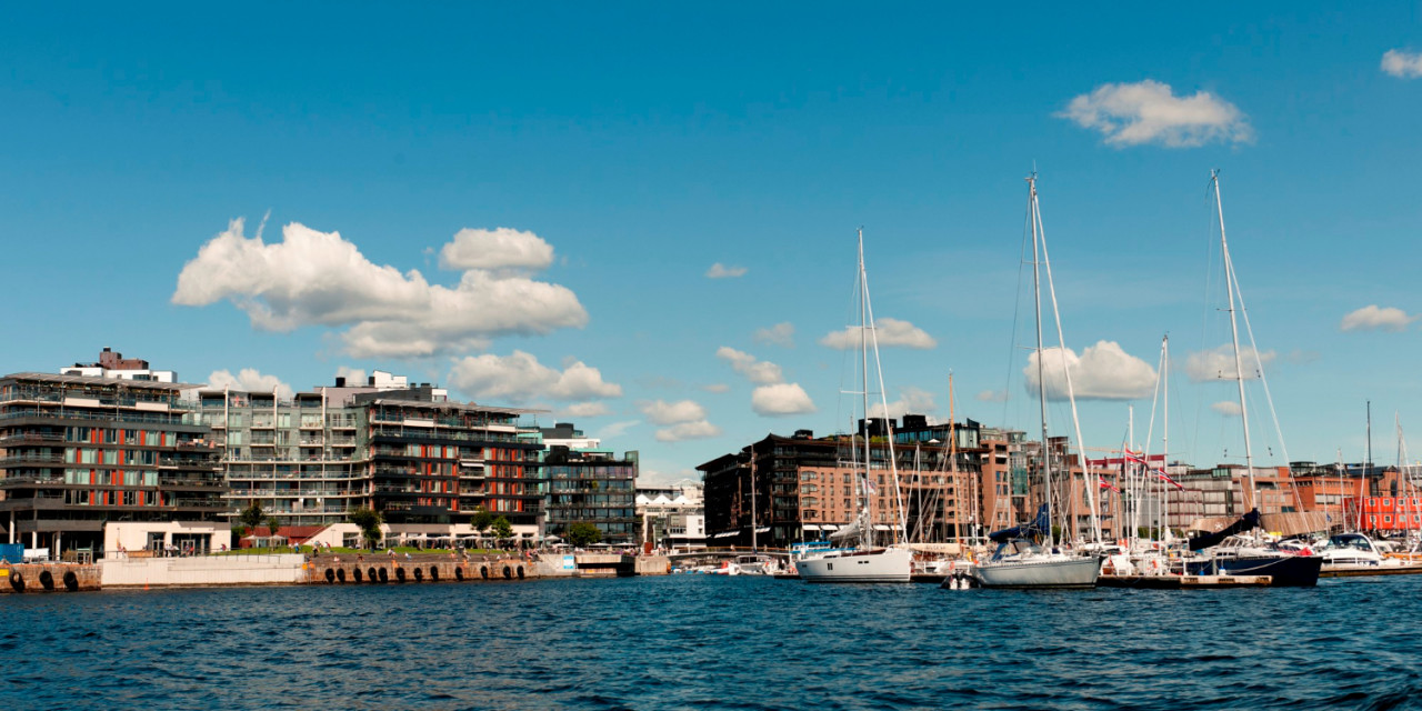 boats with buildings oslo harbor oslofjord oslo norway