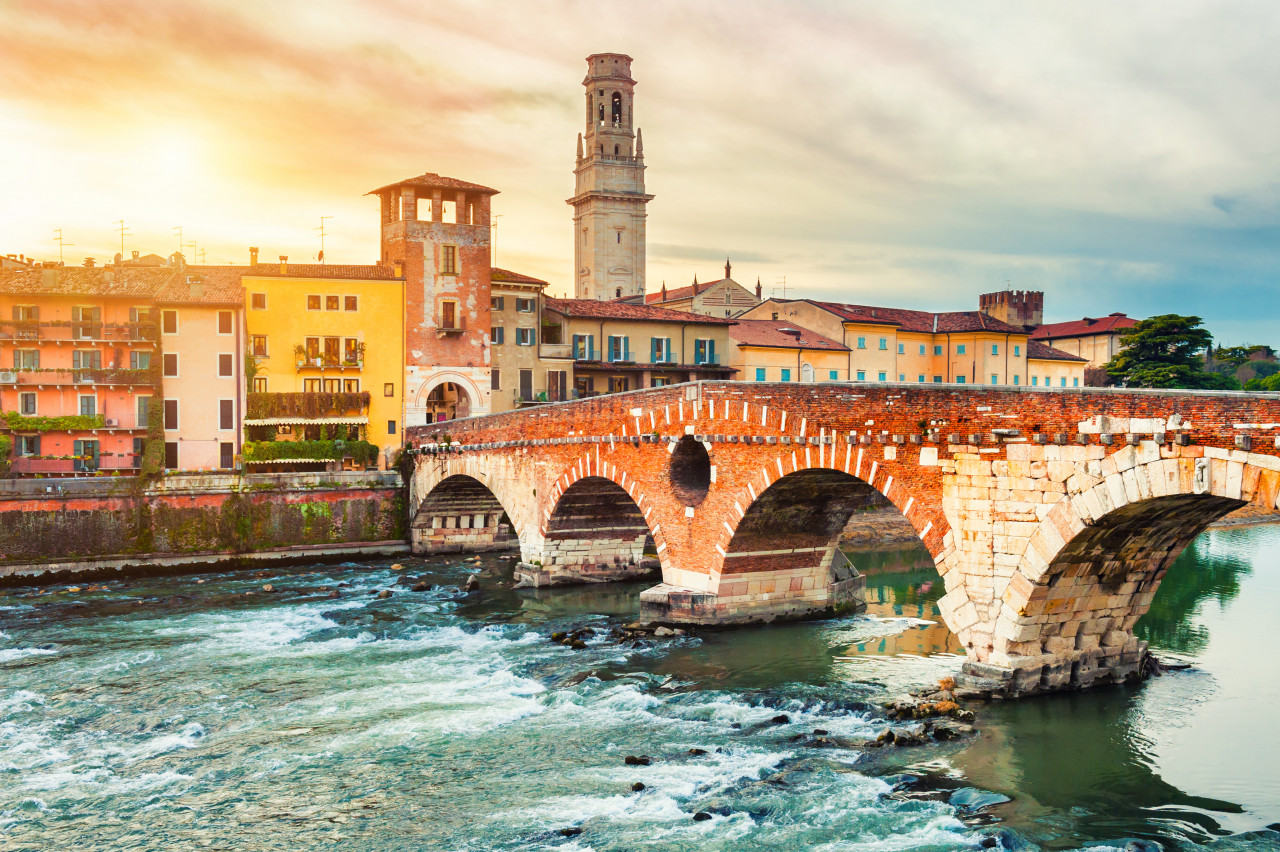 bridge ponte di pietra ancient buildings sunset verona italy