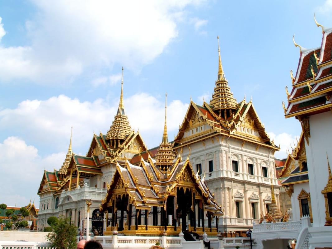 brown and white temple under blue sky