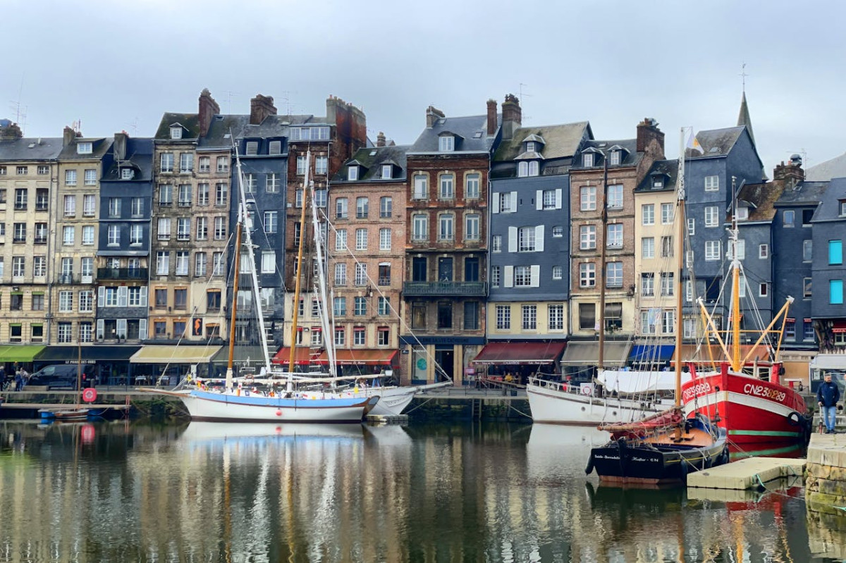 charming honfleur harbor with sailboats and historic buildings