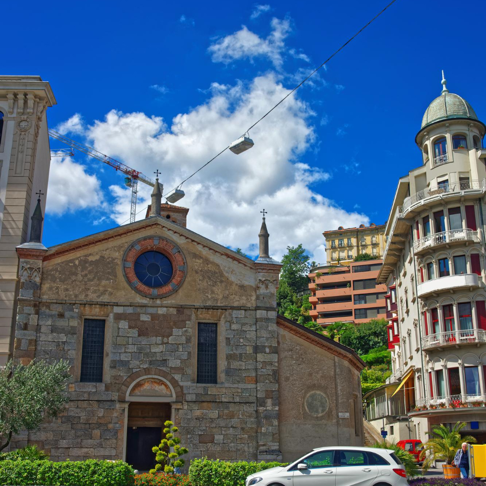 church santa maria degli angioli promenade luxurious resort lugano ticino canton switzerland people background