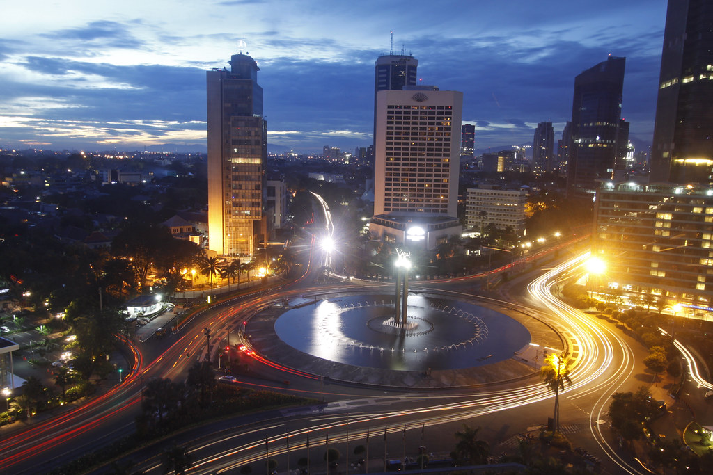 city and traffic lights at sunset in jakarta