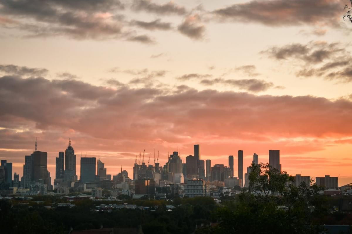 cityscape under dramatic sky