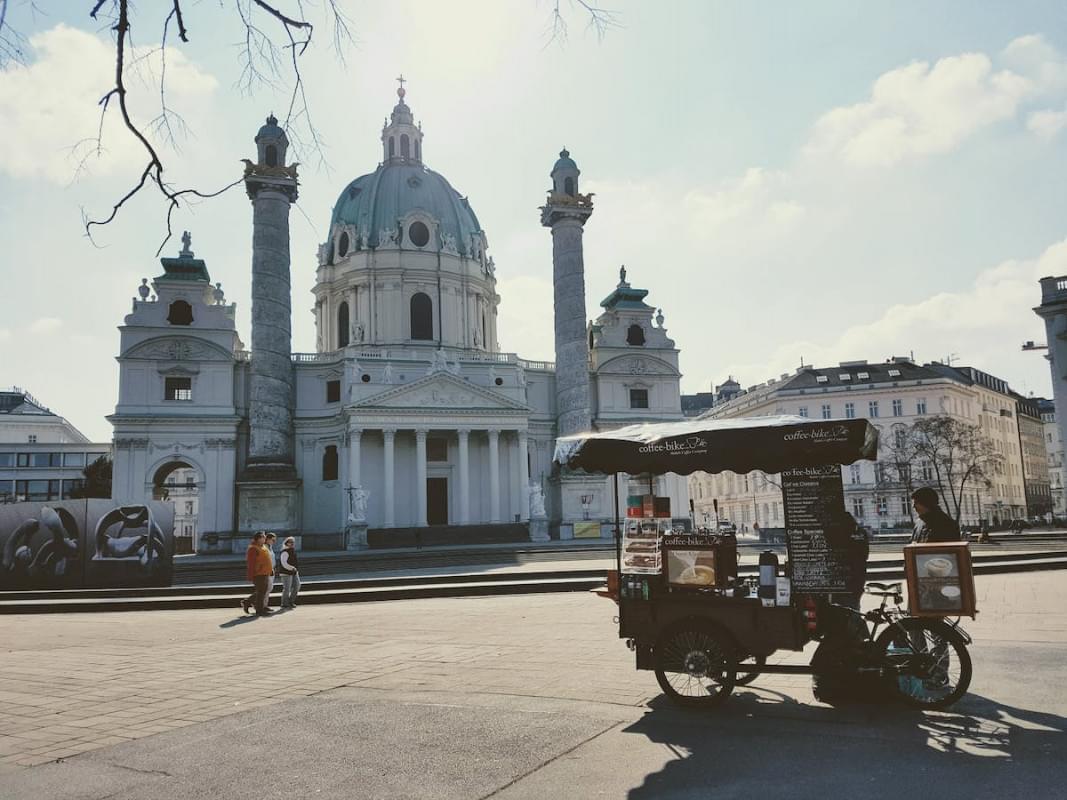 coffee cart in front of karlskirche in vienna austria