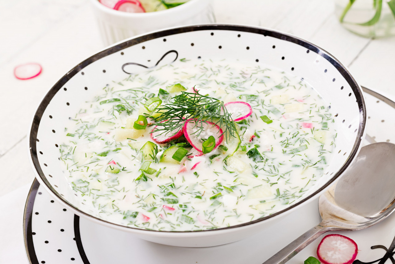 cold soup with fresh cucumbers radishes with yoghurt bowl wooden table traditional russian food okroshka vegetarian meal