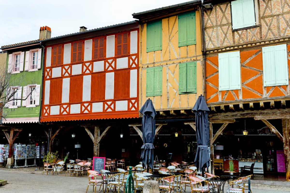 colorful half timbered buildings in mirepoix square