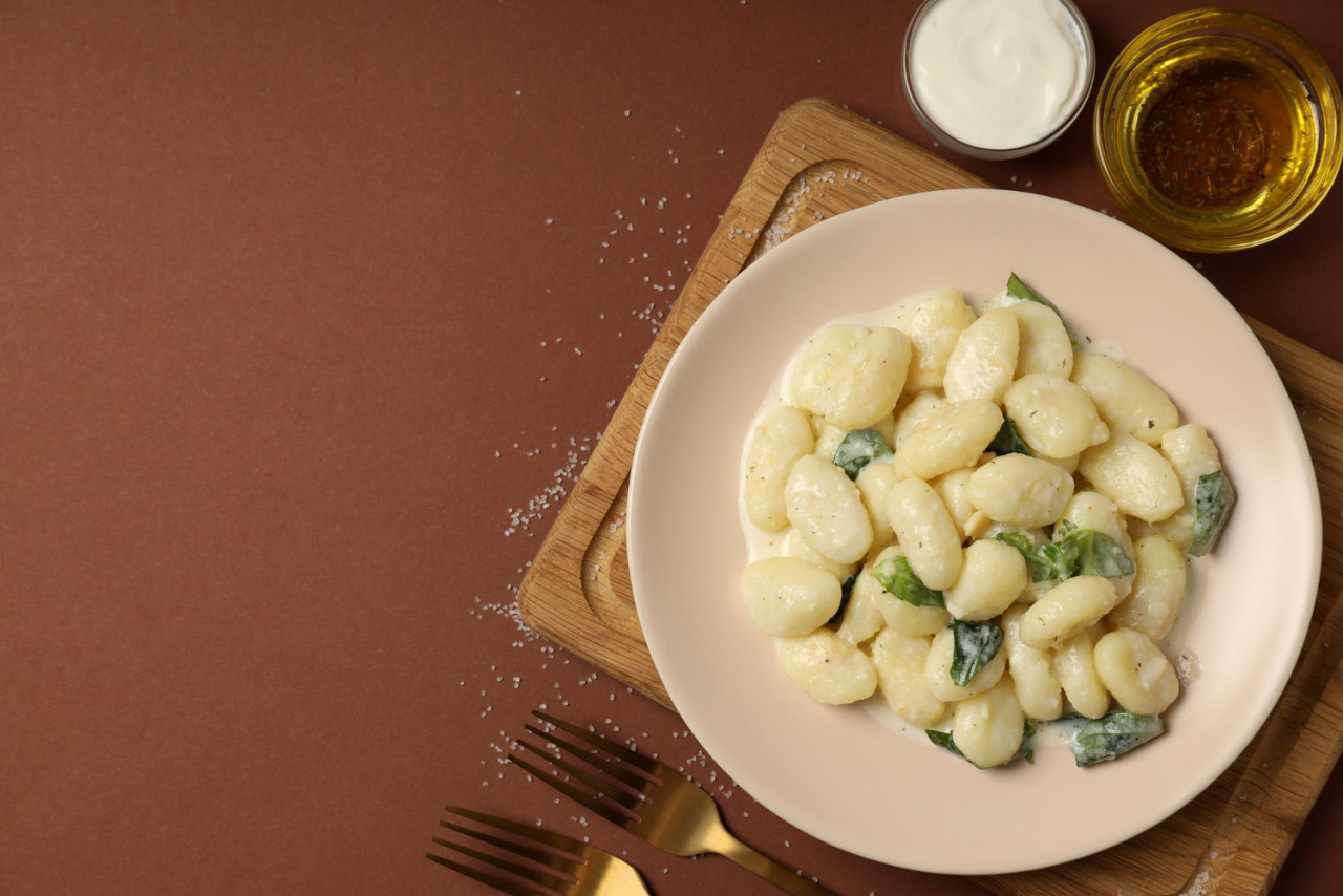 concept tasty food with gnocchi space text