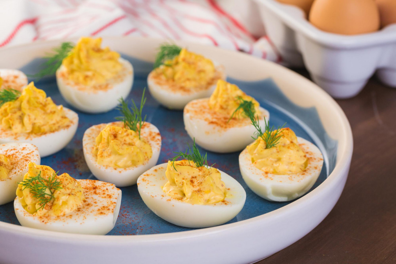 deviled eggs garnished with fresh dill