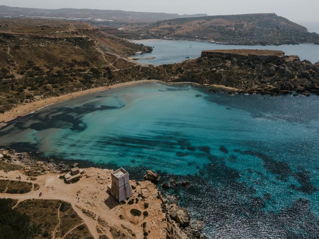 drone shot of a beach in malta