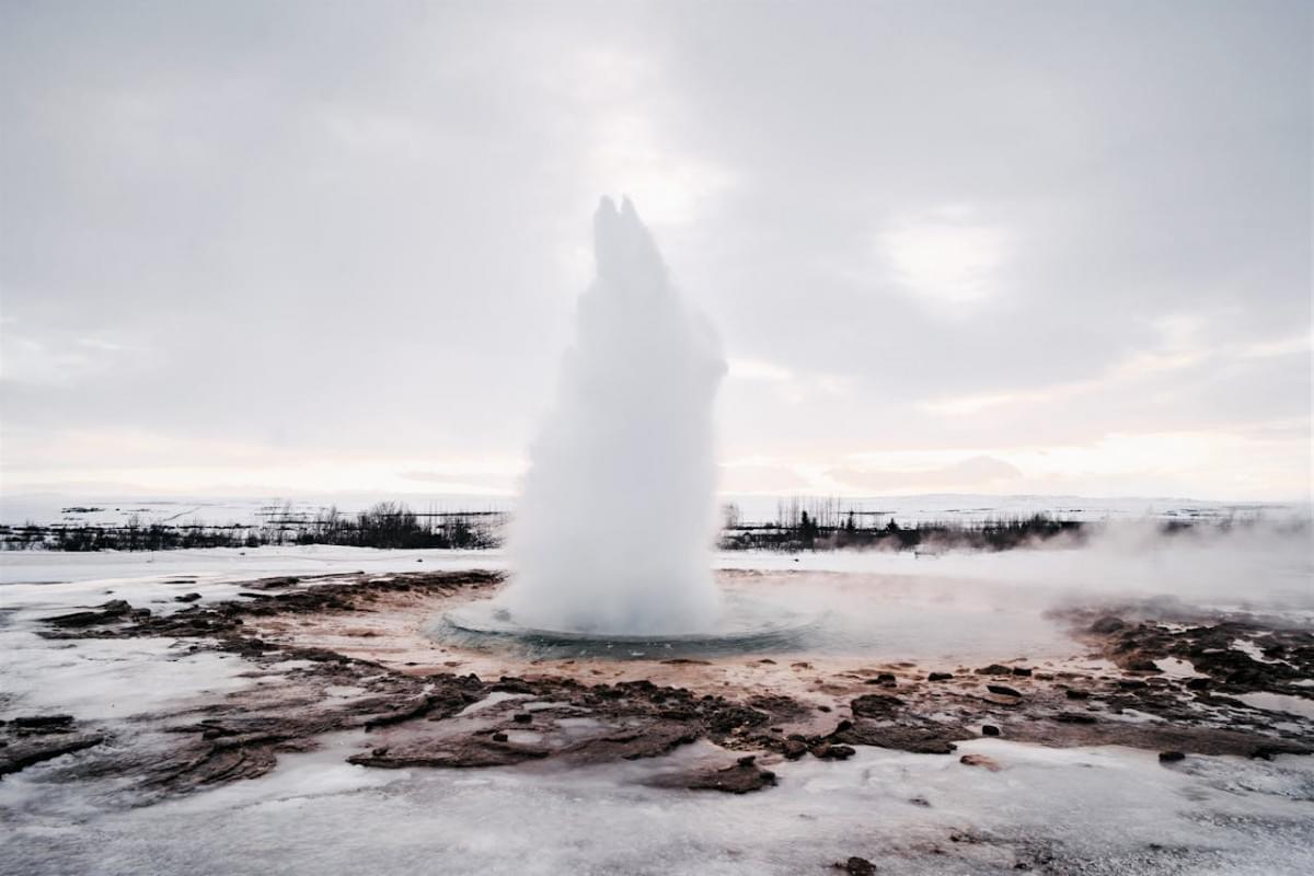 eruption of strokkur geyser in iceland 1