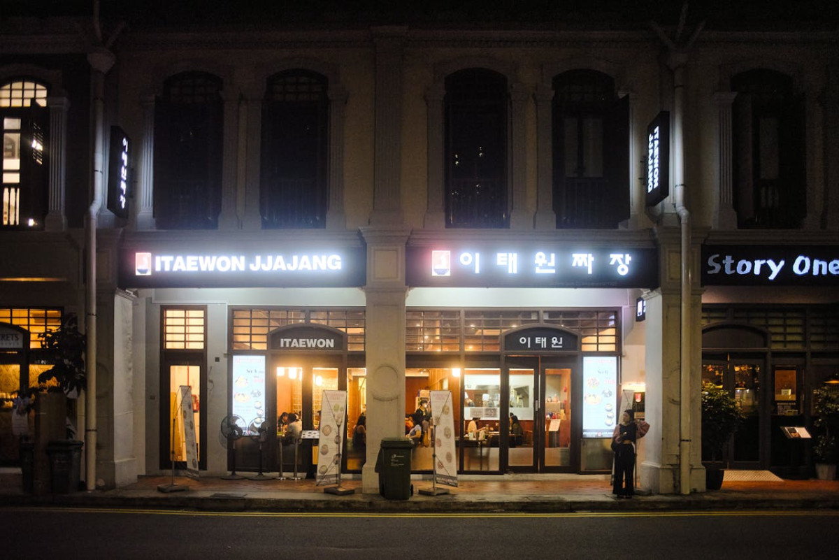 facade of itaewon jjajang restaurant at night