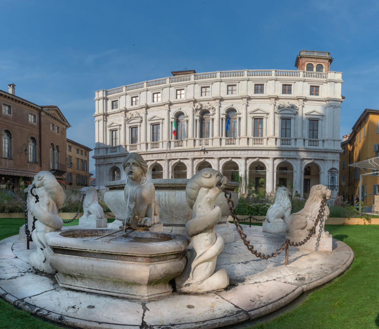 fountain old square with background carrara bergamo library