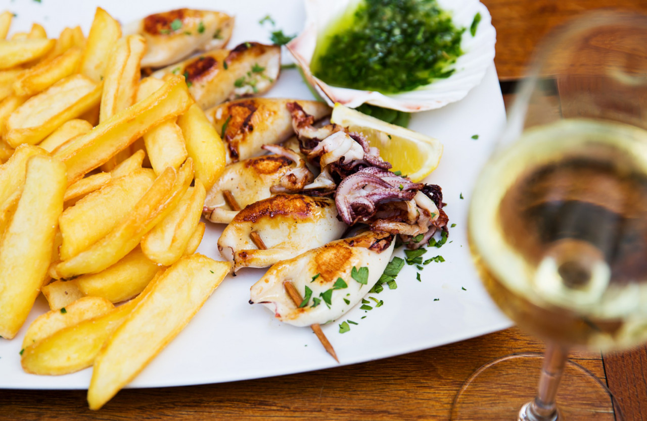 fresh fried grill calamari with fries restaurant slovenia istrian traditional seafood dish