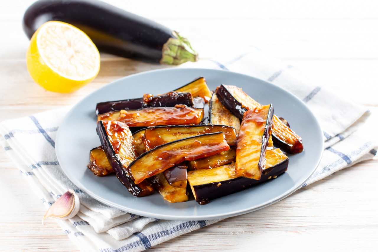 fried eggplant dipped honey plate