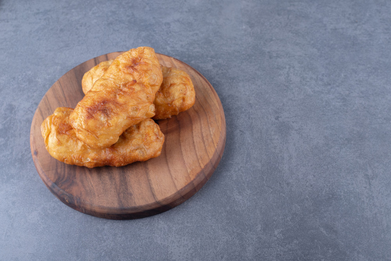 fried pirozhki board marble table