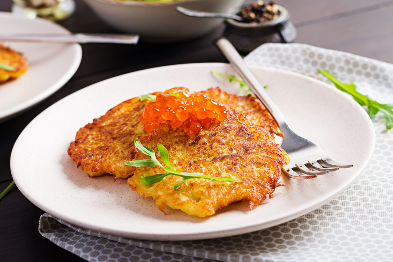 fried potato pancakes with red caviar sour cream fritter roesti