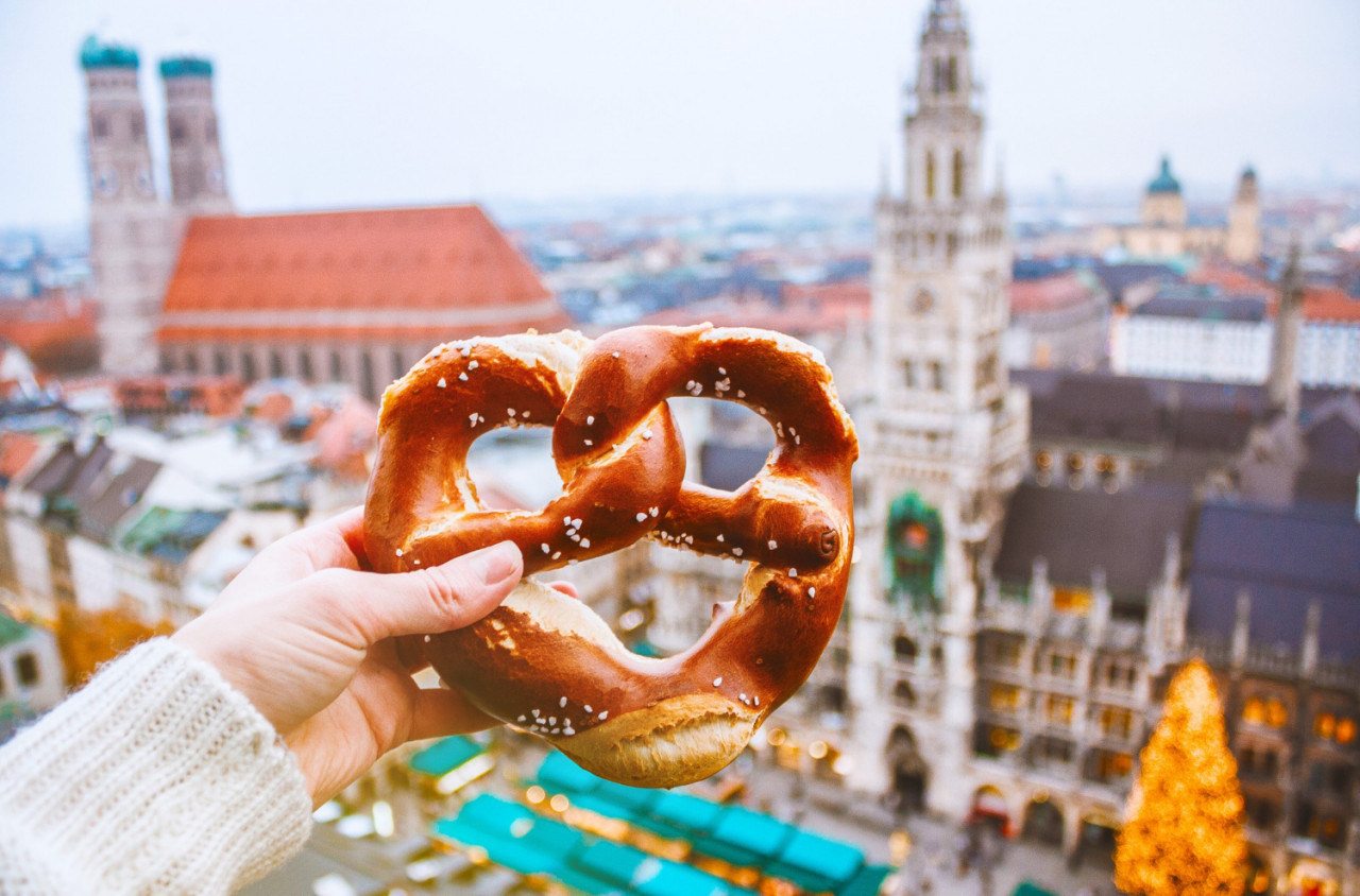 hand with traditional german bread bretzel