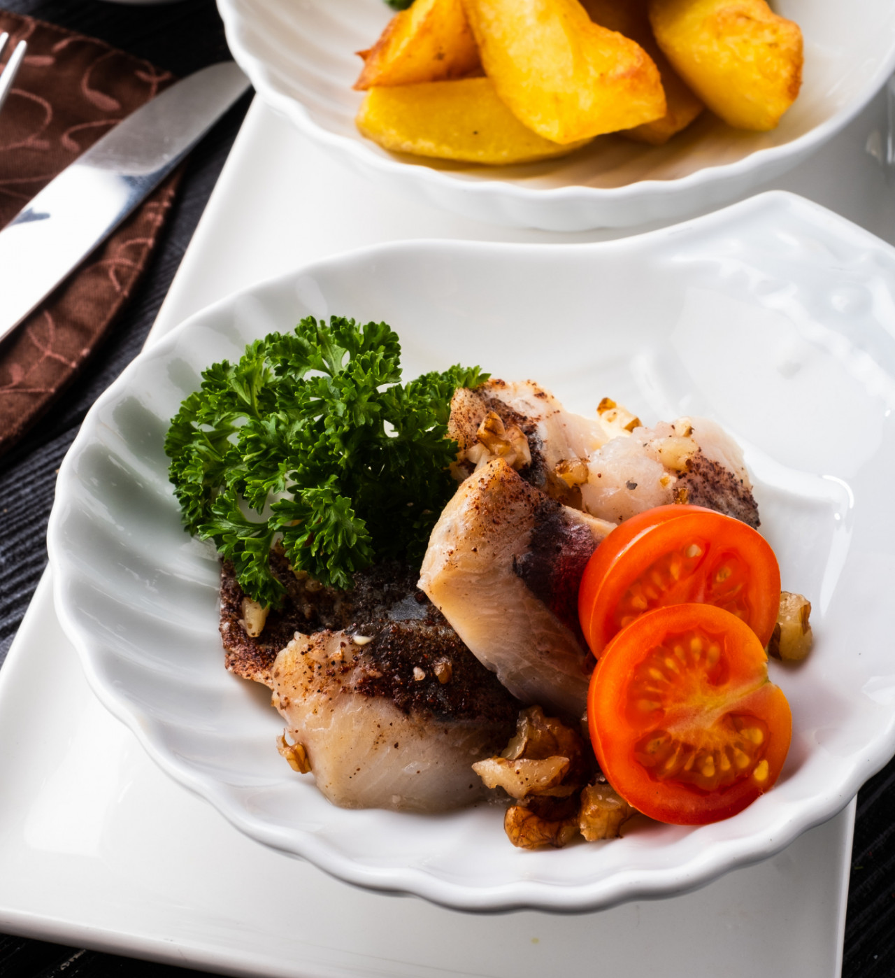 herring snack with walnuts cinnamon garnished with baked potatoes