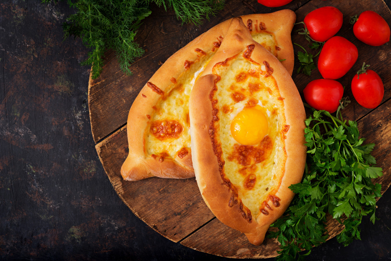 khachapuri adjarian open pie with mozzarella egg georgian cuisine